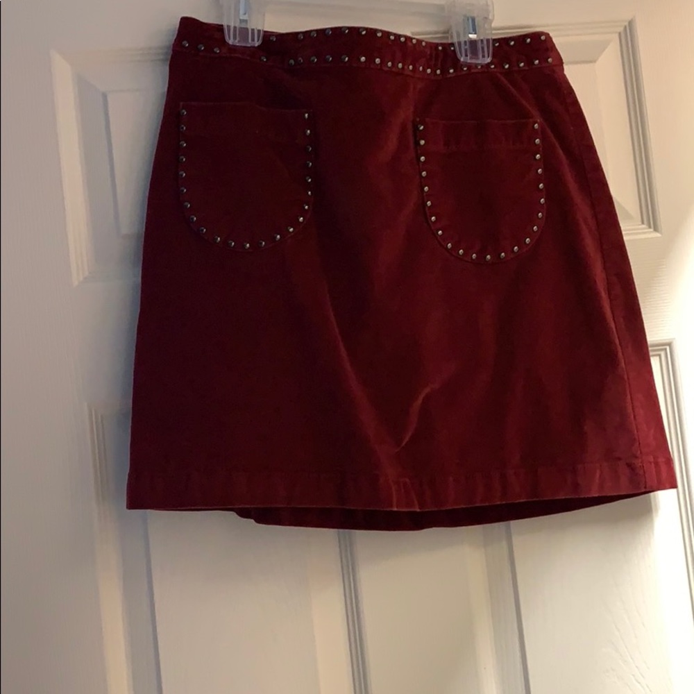 Maroon mini skirt, velour material.
